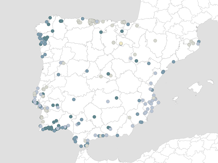 A map of the Iberian Peninsula showing numerous archaeological sites marked by colored dots, mostly concentrated along the coasts.